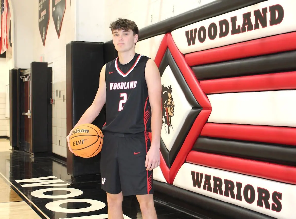 Nolan Price was a pretty good basketball player in his junior year.Woodland‘s two-guard put together a nice overall season for the Warriors, averaging 9.2 points per game as the team’s tertiary threat behind a pair of career 1,000-point scorers finishing out their prep careers.So it would be unfair to suggest Price’s 2025-26 season came out of nowhere.It would not be unfair, however, to posit the sharpshooter’s senior season – and, as a result, that of the Warriors – exceeded all expectations.“I knew I was going to have to be ‘that guy’ for our team from the beginning,” Price said. “As soon as last year was over, I was already starting to play again.”Price averaged 16.9 points, 2.9 rebounds, 2.2 assists and 2.2 steals per game as Woodland won 25 games, claimed its first conference title since 1979 and notched its first regional championship since 1989. Along the way, he won the Tri-County Conference Player of the Year award, was named unanimous first-team to the All-TCC and Times All-Area Team, was third-team Illinois Basketball Coaches Association All-State and made the second-most 3-pointers in a season (156 at a 41.9% rate) in IHSA history.For all his accomplishments, Price is the 2026 Times Boys Basketball Player of the Year. “We all knew he could be a special player since he was in junior high,” Woodland coach Connor Kaminke said. “But the step he took this year was just historic. You ask him, you ask any of our staff. We all knew how good he could be, but he just knocked his potential out of the park.“He absolutely had a historic individual season that led to our team’s historic season.”Price is the first Woodland Warrior to win The Times Boys Basketball Player of the Year honor, which has been awarded every season since 2006.“It was really exciting when I heard about it,” Price said, “[and to be the first Woodland winner] actually does mean a lot. I know there have been some really good players to come through Woodland. It means a lot that I’m the first one.”Part of Price’s jump in his senior season was the result of increased opportunity. Part of it was how long he and his teammates had played alongside each other wearing the Woodland black, red and white, developing into a true team.But perhaps even more vital was the work he put in – including playing offseason travel basketball for the first time, with the Illinois Clutch out of El Paso – getting ready for his breakout performance.“Everything he’s achieved this season is well-warranted and earned, and every person who knows him would say the same thing. He’s just easy to cheer for,” Kaminke said.“He’s a respectful kid. He works hard. He does things for the right reasons. A huge part of what this program’s become is because of what he’s done on a daily basis for not only the program, but for his teammates, everyone surrounding him, the school and for myself.”Price knows the 3-pointer is the centerpiece of his game, but sees himself as more of a well-rounded basketball player. Complementing and complemented by fellow Woodland starters Jaron Follmer, Nate Berry, Noah Decker and Brezdyn Simons and sixth man Grant Wissen, he proved that to be the case, and the wins, records and awards kept piling up.“I see myself as a guy where, if there’s a big shot needing to be hit, I was always ready to step up in that kind of situation,” Price said. “But I like to be an all-around player, get everyone involved.“[This team has] been playing together forever, and I feel like everything on the floor, we just clicked together and were always on the same page. I feel like that’s the key to success for a good team.”Price isn’t sure what awaits him after high school, although he is planning college visits with an eye on continuing his basketball career. The support he’s received from his teammates, coaches, the Woodland community and his family has all been key in his success.“I would love to give a shoutout to my parents,” he said. “They’ve supported me for longer than I can remember and always just been there for me. My grandma, too. She always comes to every game, and they’re the first people I want to see after the game.”