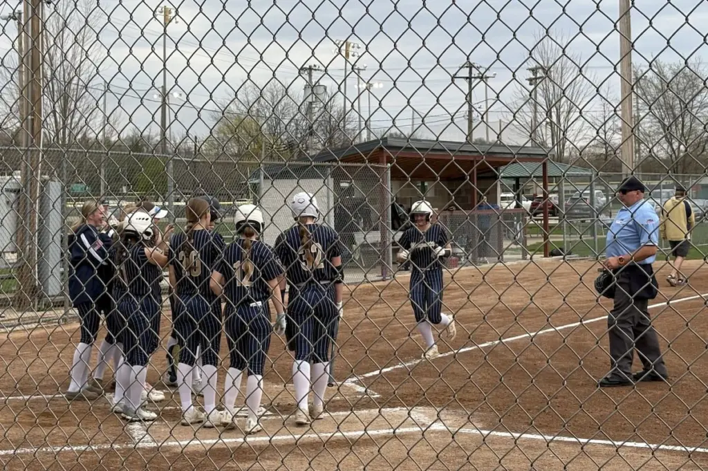 It didn’t take very long for Marquette Academy‘s starting pitcher and leadoff hitter Hunter Hopkins to leave her mark in the Cru’s win over Woodland/Flanagan-Cornell on Thursday in Ottawa.Hopkins started the game with two strikeouts in a scoreless first half-inning, and when she stepped up to the plate to lead off, she squared up a pitch and launched a home run to center field.It was off from there, as the Cru proceeded to put up an eight-run first inning followed by a 10-run second inning to clinch an 18-0, mercy-rule victory.Hopkins did more than just hit a leadoff home run. She took full advantage of every plate appearance, going 3 for 3 with three over-the-fence home runs.“Three home runs, and she pitched lights-out. There’s really not much more you can ask for,” Marquette coach Curtiss Johnson said of Hopkins. “She competes every time out, and these types of performances are nothing new to us at this point. She’s a top-notch competitor in this area.“I honestly don’t know if there’s anyone better.”Marquette improves to 10-2 overall, 3-0 in the Tri-County Conference.Hopkins drove in eight runs and earned the win pitching, with the rest of the Crusaders lineup doing its part as well. Third baseman Lily Brewer went 2 for 3 with three RBIs, right fielder Taylor Gamons went 1 for 1 with an RBI, and center fielder Emily Ryan-Adair went 1 for 1 with two RBIs and a walk.While there was certainly a lot to be pleased with, Johnson said he was mostly impressed with his team’s plate discipline and hustle defensively.“I thought our girls were very disciplined today,” he said. “We talked about that all week – staying in the zone, staying within ourselves and sticking to our approach.”For the Warriors – now 0-4 both overall and in the TCC – head coach Sydney Plekso said this early part of the season has been simply about playing hard and getting her younger players experience at the varsity level.“We have a lot of freshmen this year, so it’s definitely been a point of emphasis for us to grow from these games,” Plekso said. “We have a lot of conversations about trusting the process - reminding my team that these girls we compete against have been in their shoes before. Sometimes they have three or four years of experience over us. We just tell our girls to go out there, do their best and leave it all on the field. ...“I do think they’re starting to find their confidence and approach, though. We’re starting to have more quality at-bats. Once they gain that experience and clean up the little mistakes, I know we’ll be a lot better for it.”Nevertheless, Plekso emphasized how talented the Cru’s roster is and wants her team to play against tough competition.“Credit to Marquette, for sure,” she said. “We’re in a really strong conference, and a lot of these teams are super talented, and many have almost all of their starters back.”With limited at-bats, catcher Kaylee Henert and third baseman Teagan Rich collected the Warriors’ only hits.