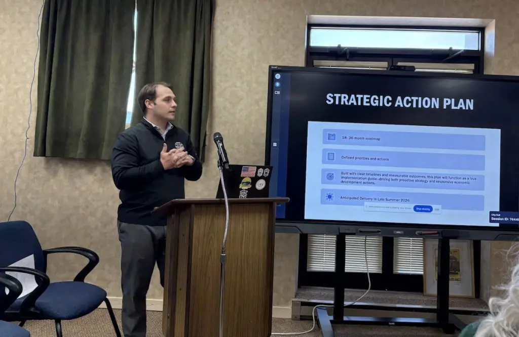 The Princeton City Council received an update on the recently approved business development district during their meeting on Monday night.A BDD serves a similar role to a tax increment financing district by providing funding for business and redevelopment projects in Princeton, although it relies on sales tax revenue instead of property taxes.If created, the district would be paid for through an additional sales tax on certain retail purchases made within the district.Notably, the tax would only apply to items meant for “immediate consumption,” such as meals at a restaurant, snacks or drinks, but would not apply to groceries, prescription drugs or titled items such as vehicles.The city would use the money to support projects inside the district, such as infrastructure/building improvements and new business development.With the district getting officially approved in March, the city is still in the early stages of implementing both the business development district and its overall plan going forward.Cole McDaniel, with Hometown Consulting, gave a presentation to the council on how the city plans to move forward, outlining a strategic action plan along with introducing other tools the city will utilize to make Princeton a more attractive option for future businesses.“We didn’t just want to create a business development district- we wanted to set goals and have active plans for how we’re going to implement this funding going forward,” McDaniel said.He said that groundwork has included identifying the district’s boundaries, gathering community feedback and outlining priorities, but the city is now shifting toward how projects will actually be selected and funded.“It’s one thing to have ideas- we also want to understand how we’re going to fund them and measure whether they’re actually working,” he said.That includes developing a formal application process for businesses and a scoring system to evaluate proposals, along with tools to track how funds are spent and what impact they’ll have over time.At the same time, McDaniel said a five-year strategic action plan is being built to guide those decisions, using input from community meetings, business owners and local officials.“Our goal is to have a true five-year strategic action plan with priorities, the timeline and how we accomplish them,” he said. “We want to understand in order to implement this, here’s how we’re going to have to pay for it.”McDaniel said his goal is to have a draft of that by “sometime in the middle of the summer,” with the intent for the council to review and adopt the plan later this year.Once completed, the plan will serve as both a local roadmap and a tool for securing outside funding.“It’s going to be one of the most important scoring metrics when we go after grant funding,” he said. “We want to make sure it’s there, it’s adopted and we can include it with our grant applications.”McDaniel emphasized that the effort is designed to ensure results are measurable over time.“I don’t want to just hand you a plan and help you implement a BDD and then never see you again,” he said. “I want to be here by your side to help you implement these things and be a part of the progress.”