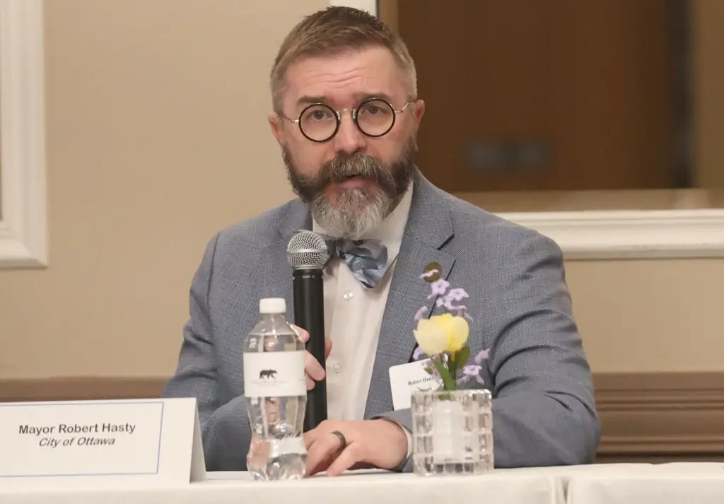 Ottawa mayor Robb Hasty and Oglesby mayor Jason Curran spoke about their city’s future during the Illinois Valley Area Chamber luncheon on Thursday afternoon.Hasty opened his speech by thanking and congratulating IVAC director Bill Zens, who will step down in June, before turning his focus to Ottawa’s downtown growth and future riverfront plans.“I want to thank IVAC for putting this all together,” Hasty said. “And I want to specifically wish Bill (Zens) a successful next endeavor. You were great to work with.”Hasty first pointed to momentum from local organizations behind Ottawa’s growth, including recent grant funding secured by the Ottawa Visitors Center.“The visitor’s center has been doing great things recently, and has acquired two different grants that equal about $170,000,” he said. “They’ve used a good portion of that for some additional regional exposure. If you’re watching Chicago Blackhawks games and WGN, you’re probably going to see the city of Ottawa mentioned on the broadcast.”Downtown improvements were also a focus of Hasty’s speech, particularly efforts led by the Ottawa Downtown Association.“You already see a difference in our downtown this spring,” Hasty said. “There’s a dedicated amount of people who are working on these beds and they’re already starting to sprout.”The city’s push to grow small businesses is also gaining traction through a startup incubator program.“They had 26 applicants when it closed; we don’t even have 26 storefronts,” Hasty said. “That’s a good problem to have.”Hasty said broader collaboration is driving results through the city’s “Hope for Humanity Initiative.”“We bring in different not-for-profit organizations to network, meet one another and trade ideas,” he said. “We’re already seeing dividends from this program.”Regardless, Hasty believes downtown redevelopment remains one of the most visible signs of growth and Ottawa has shown that in recent years.“If you drive down Main Street and look at the storefronts with signs on it, you’ll see in many of them that there’s construction going on,” Hasty said. “We’re getting more and more tenants who are coming in and living in downtown Ottawa, and that’s a very good sign.” Looking ahead, Hasty pointed to long-term riverfront plans, including setting up a hopeful 2028 conpletion of the new amphitheater.Curran addressed the crowd after Hasty, immediately noting that it’s tough to speak after Ottawa because of the difference in town size and budget. However, Curran said, although the growth isn’t as visible and projects take some more time, there’s still a lot of positive things happening in Oglesby.On infrastructure, the city recently secured $1 million in federal funding for a water line project, helping offset costs tied to a wastewater treatment system expected to exceed $20 million.The city is also addressing long-standing issues such as sidewalk gaps and railroad crossing delays, while construction has begun on projects funded through a Safe Routes to School grant.“It’s not flashy stuff, but it’s important,” he said. “These are the kinds of things people deal with right outside their front door.”Curran also made sure to talk about how proud he was of the city’s festivals, including the annual summer fun fest’s Sensory-friendly Night. Sensory-friendly Night debuted last year and allows people with special needs a more low-key, quiet night than a typical carnival night.“People showed up, they made memories, and it meant something to them,” Curran said. “That’s the kind of thing we want to keep going.”He emphasized that continued engagement among officials and residents is key to Oglesby’s future.“People care, people pay attention,” Curran said. “We are moving forward as a city altogether, and we want to see it succeed together.”