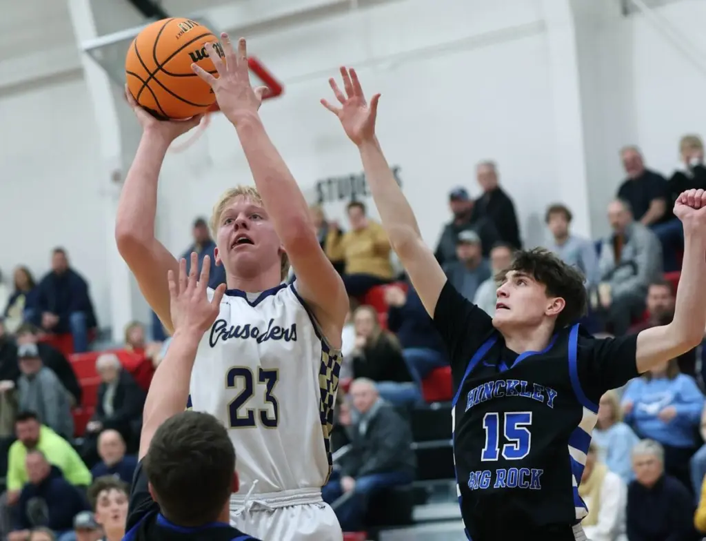 The Marquette boys basketball team used a late first half spurt to grab the lead and held off Hinckley-Big Rock throughout the second half in a 54-51 win in Tuesday's Class 1A Amboy Sectional semifinal.