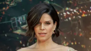 Neve Campbell wearing dress by Barney Cheng Couture attends the premiere of Skyscraper at AMC Loews Lincoln Center New York^ NY - July 10^ 2018