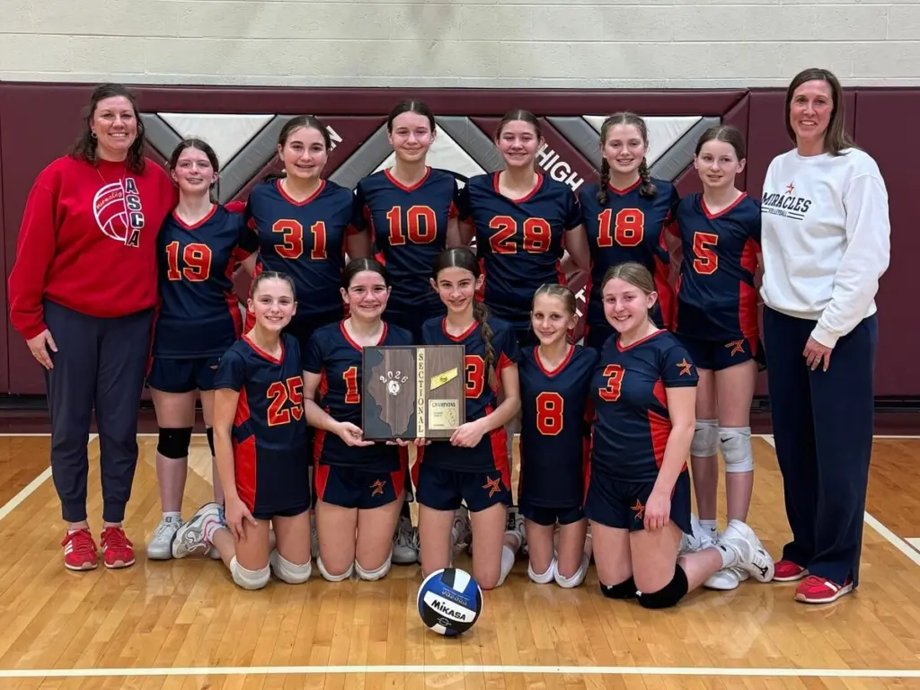 The St. Carlos Acutis seventh grade volleyball team beat Kewanee Visitation to win a Class 1A sectional title and advance to the state tournament.