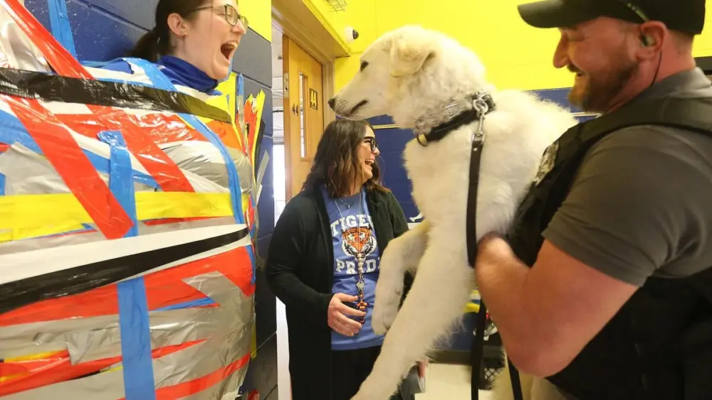 Students from 5th-8th grades held an inaugural "Tape the Teacher" fundraiser on Friday, March 20, 2026 at Logan Jr. High School in Princeton. Each grade level was assigned a designated time and had the opportunity to tape one of our four pre-selected staff members to the wall. The cost was $1.00 per strip of duct tape. Students got to purchase as many strips of duct tape to help get their favorite staff member get “stuck” to the wall. The proceeds from the event benefited the Logan JH Booster Club, which directly supports students.