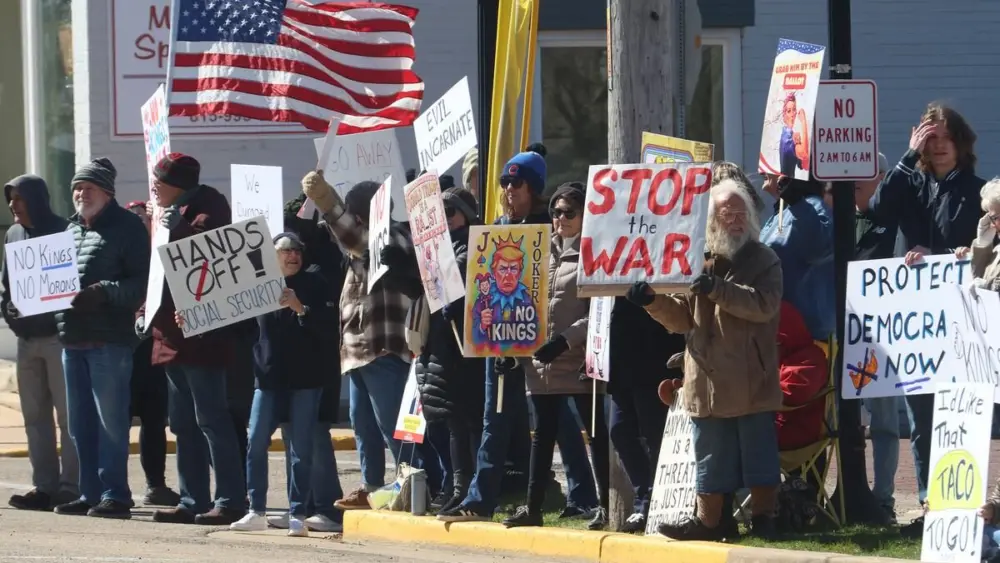Over 100 people gathered for a "No Kings" rally on Saturday, March 28, 2026 at Rotary Park in Princeton.