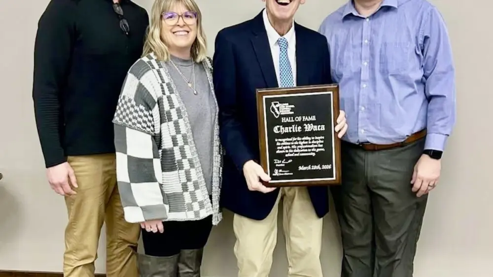 Charlie Waca, who had a 38-year coaching career as an assistant football coach, was inducted into the IHSFCA Hall of Fame on Saturday. His catch phrase  "that it's a good day for football" will be forever remembered by his players.