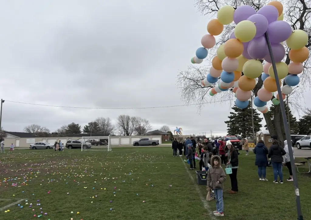 Families and children take part in an Easter egg hunt Saturday, April 4, at Peck Park in Ottawa.