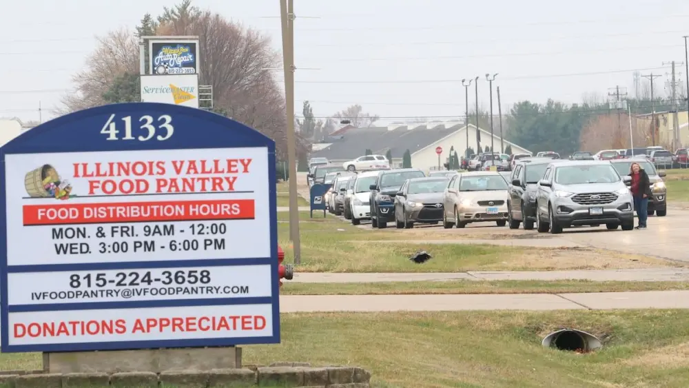 The Illinois Valley Food Pantry’s fund drive to raise $750,000 to pay for its new building is more than halfway toward meeting its goal.