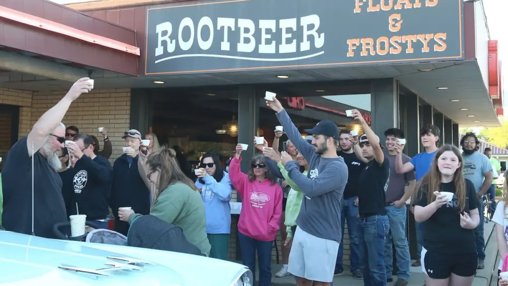 Hundreds gathered for a tribute to Ron Moore, the former longtime owner of the Root Beer Stand on Saturday, April 25, 2026 in Oglesby. Moore passed away on Wednesday. A root beer shot and moment of silence was held for Moore during the event. The restaurant also held its first Kick-Off Car Cruise of the season. Donations from the cruise helped fund the Kids Hot Rod Camp held June 15-19 at "The Rock" Walnut Community Bible Church in Walnut. The camp is open to kids ages 12-17.