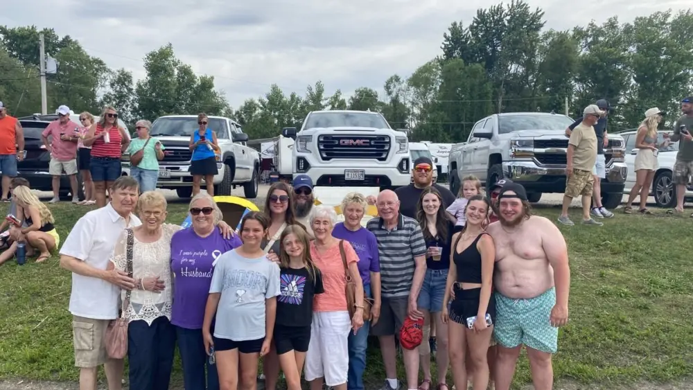 Members of the Jack Koch family, along with members of the Illinois Valley Alzheimer’s Caring Friends Support Group, raised $1,100 at the second annual cardboard race held May 30 at the Spring Valley Boat Club.