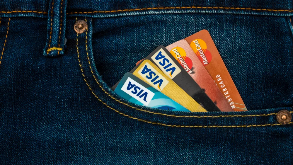 blue-cloth-jeans-with-credit-card-in-front-pocket