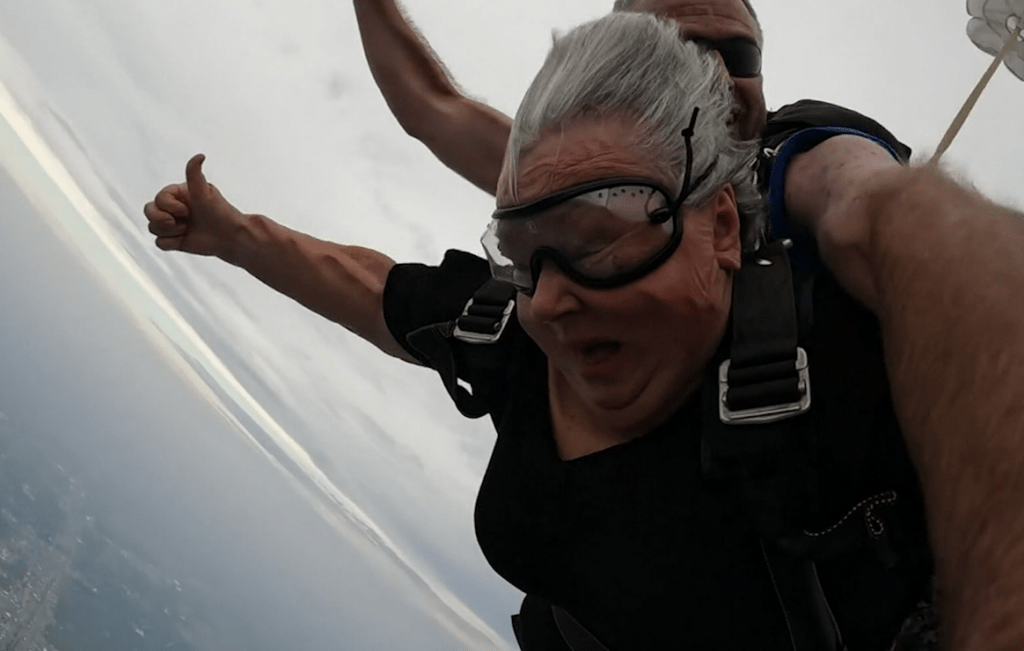 Former rugby player completes 24,000ft skydive while clutching ball | Sport  | Independent TV