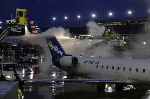 The Latest Plane skids from runway at Chicago airport WBAL