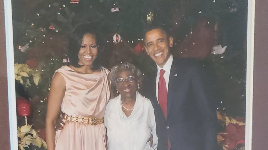 Catherine Gaines with Michelle and Barack Obama. Photo Credit: Aspenwood Senior Living