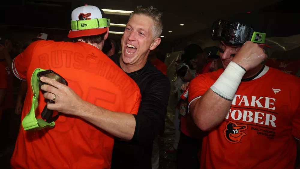 BALTIMORE, MARYLAND - SEPTEMBER 17: Executive Vice President and General Manager Mike Elias of the Baltimore Orioles celebrates in the clubhouse after his team clinched a 2023 MLB playoff berth after defeating the Tampa Bay Rays at Oriole Park at Camden Yards on September 17, 2023 in Baltimore, Maryland. (Photo by Patrick Smith/Getty Images)