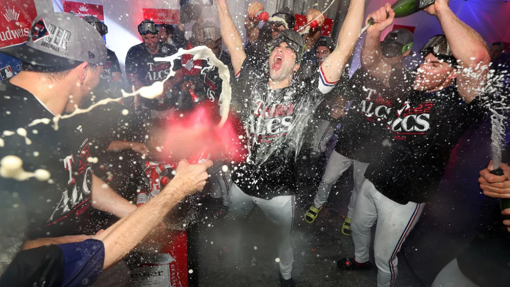 OCTOBER 10: The Texas Rangers celebrate after defeating the Baltimore Orioles during Game Three of the Division Series at Globe Life Field on October 10, 2023 in Arlington, Texas. (Photo by Richard Rodriguez/Getty Images)