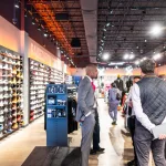 Commissioner Richard Worley and Baltimore Police Department at a shoe store.