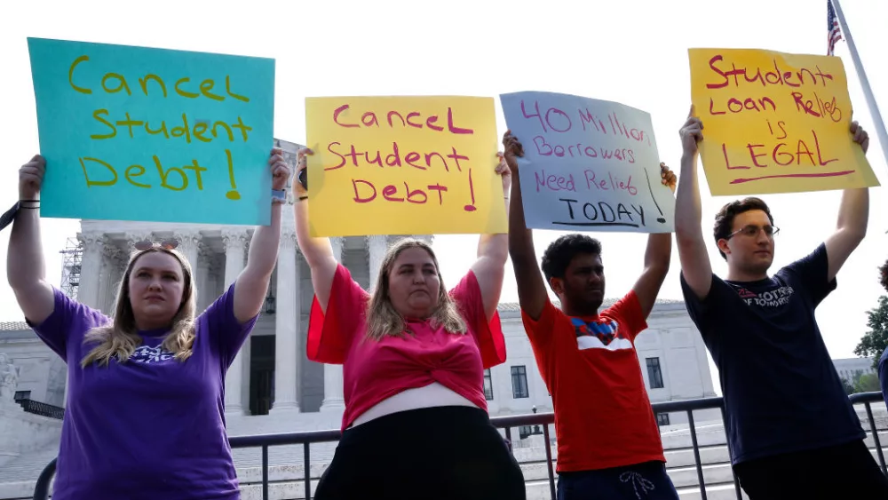 WASHINGTON, DC - JUNE 30: Student loan borrowers demand President Biden use "Plan B" to cancel student debt Immediately at a rally outside of the Supreme Court of the United States on June 30, 2023 in Washington, DC. (Photo by Paul Morigi/Getty Images for We The 45 Million)