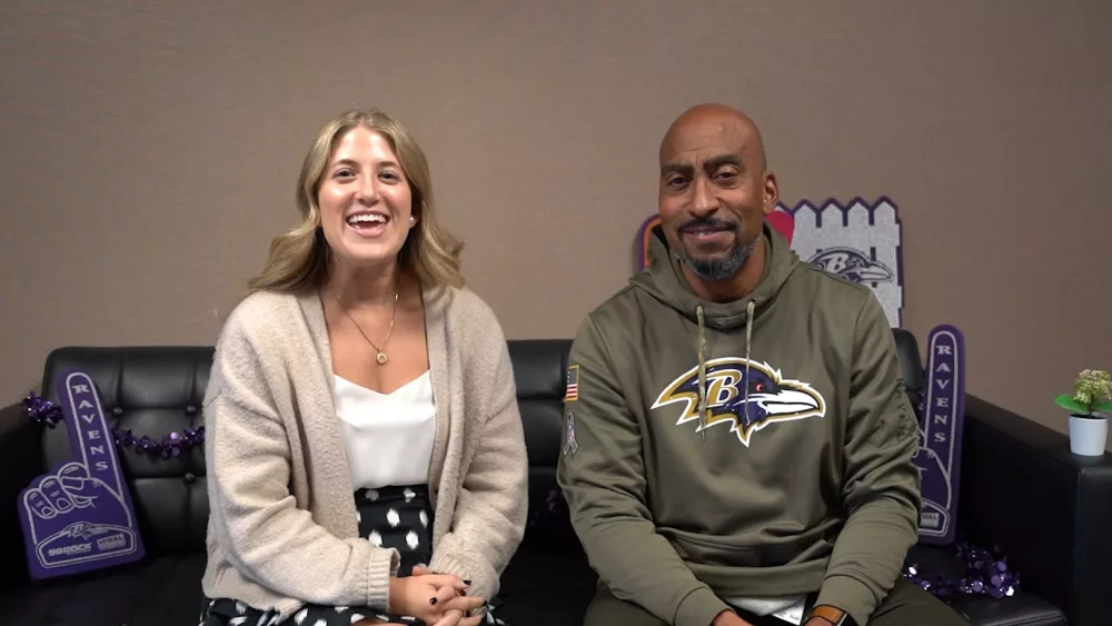 Valerie Preactor and Tony Thorton sit on a couch.