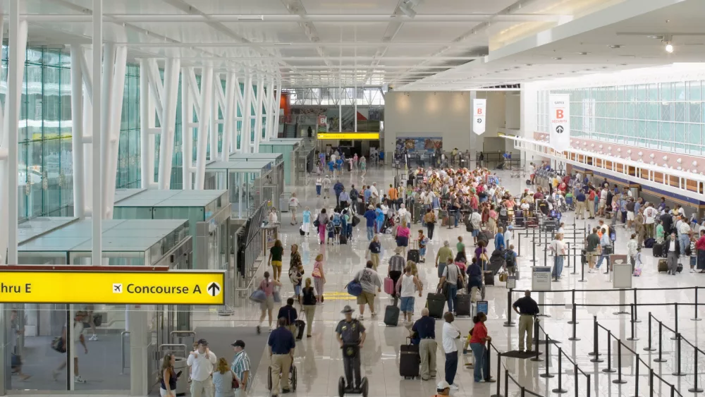 Passengers in airport terminal, elevated view