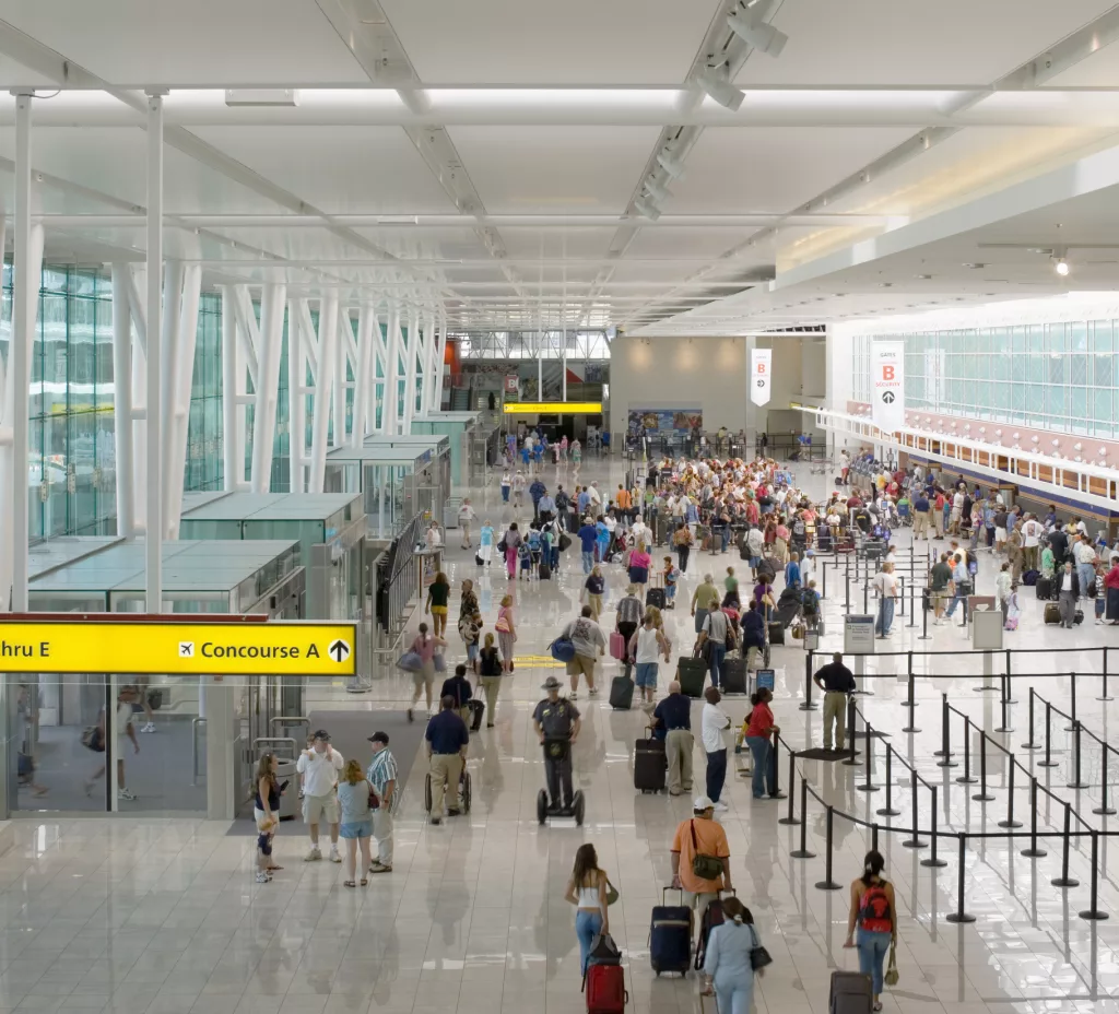 Passengers in airport terminal, elevated view