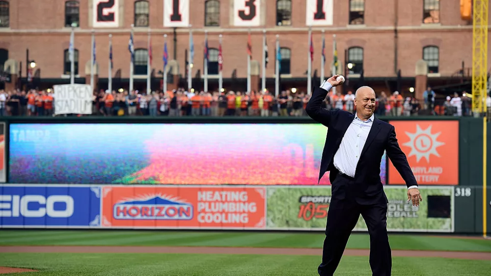 BALTIMORE, MD - SEPTEMBER 01: Hall of fame player and former Baltimore Orioles Cal Ripken Jr. throws out the ceremonial first pitch prior to the start of a MLB game between the Tampa Bay Rays and Baltimore Orioles at Oriole Park at Camden Yards on September 1, 2015 in Baltimore, Maryland. The Orioles are celebring the 20th anniversary of Ripkin's record-breaking 2,131st consecutive games played when he passed New York Yankees Lou Gehrigh on September 6, 1995. (Photo by Patrick McDermott/Getty Images)