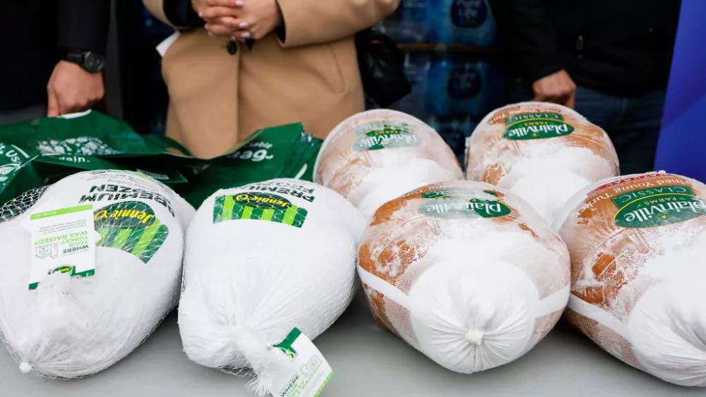 NEW YORK, NEW YORK - NOVEMBER 21: Frozen turkeys are seen on a table during giveaway at Green Valley of Sunnyside Market Place on November 21, 2023 in the Sunnyside neighborhood of Queens borough New York City. The Thanksgiving turkey giveaway was sponsored by the office of Assemblyman Juan Ardila and the National Supermarket Association. The food distribution comes as the price of food continue to increase and over a million New Yorkers face food insecurity, a number the continues to increase since the start of the coronavirus (COVID-19) pandemic according to Food Bank for New York City. (Photo by Michael M. Santiago/Getty Images)