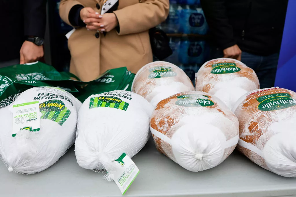 NEW YORK, NEW YORK - NOVEMBER 21: Frozen turkeys are seen on a table during giveaway at Green Valley of Sunnyside Market Place on November 21, 2023 in the Sunnyside neighborhood of Queens borough New York City. The Thanksgiving turkey giveaway was sponsored by the office of Assemblyman Juan Ardila and the National Supermarket Association. The food distribution comes as the price of food continue to increase and over a million New Yorkers face food insecurity, a number the continues to increase since the start of the coronavirus (COVID-19) pandemic according to Food Bank for New York City. (Photo by Michael M. Santiago/Getty Images)