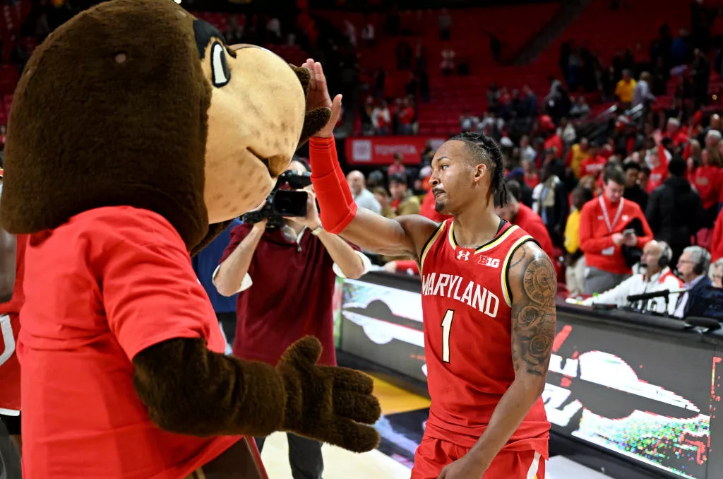 COLLEGE PARK, MARYLAND - DECEMBER 06: Jahmir Young #1 of the Maryland Terrapins celebrates with Testudo after a 81-75 overtime victory against the Penn State Nittany Lions at Xfinity Center on December 06, 2023 in College Park, Maryland. (Photo by Greg Fiume/Getty Images)