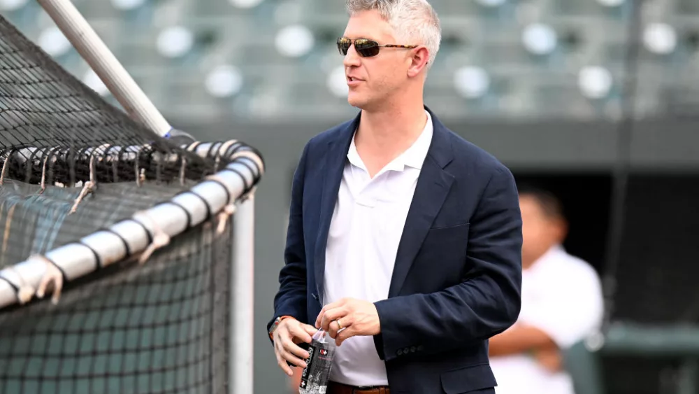 BALTIMORE, MARYLAND - SEPTEMBER 21: General Manager Mike Elias of the Baltimore Orioles watches batting practice before the game against the Detroit Tigers at Oriole Park at Camden Yards on September 21, 2022 in Baltimore, Maryland. (Photo by G Fiume/Getty Images)