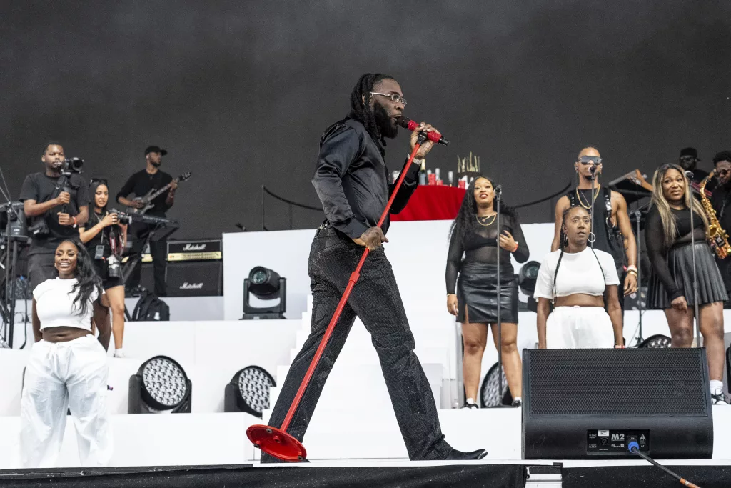 FILE - Burna Boy performs at the Coachella Music and Arts Festival at Empire Polo Club on Friday, April 21, 2023, in Indio, Calif. With rising performances at the world's biggest stages and record numbers on global music charts and streaming platforms, African acts are charting a new course for music produced on the continent, taking advantage of high-profile international collaborations, a digital boost from the internet and streaming platforms as well as new investment opportunities. (Photo by Amy Harris/Invision/AP-File)