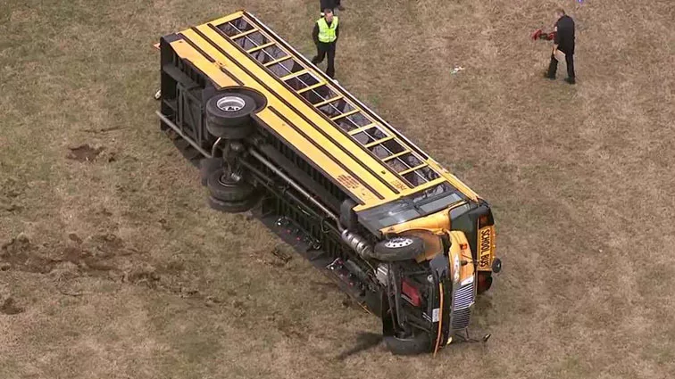 .4 students injured after school bus rolls over in Columbia