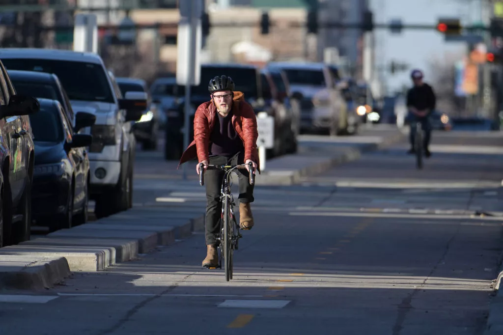 DENVER, CO - FEBRUARY 14 : Cyclists travel on the South Broadway bike lane in Denver, Colorado on Wednesday, February 14, 2024. (Photo by Hyoung Chang/The Denver Post)