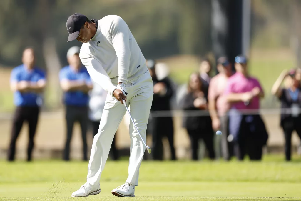 Tiger Woods hits a shank in his return to golf and opens with 72 at