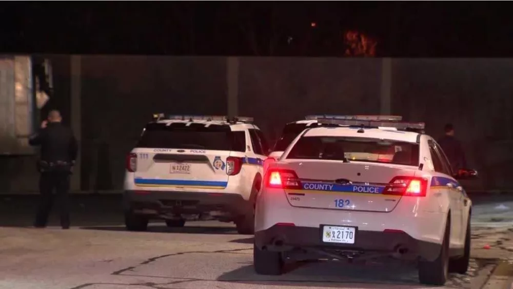 Image: Police cars in the dark, Credit: WBALTV. Story: Three Baltimore County police officers are suspended as they face charges over an alleged assault in Baltimore City. Baltimore City Circuit Court records show three officers are facing charges: Cpl. Zachary Small is charged with misconduct in office, first-degree assault, second-degree assault, reckless endangerment and violation of public safety. Officers Justin Graham-Moore and Jacob Roos are charged with misconduct in office. All three officers are suspended, 11 News Investigates learned on Friday.