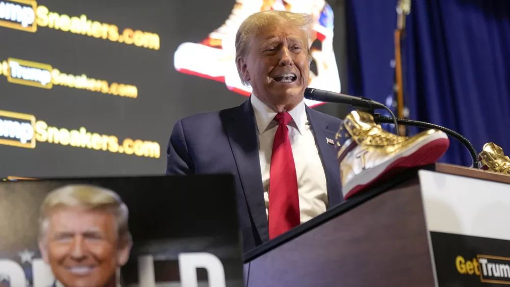 Republican presidential candidate former President Donald Trump attends Sneaker Con Philadelphia, an event popular among sneaker collectors, in Philadelphia, Saturday, Feb. 17, 2024. Trump announced a line of shoes bearing his name. (AP Photo/Manuel Balce Ceneta)