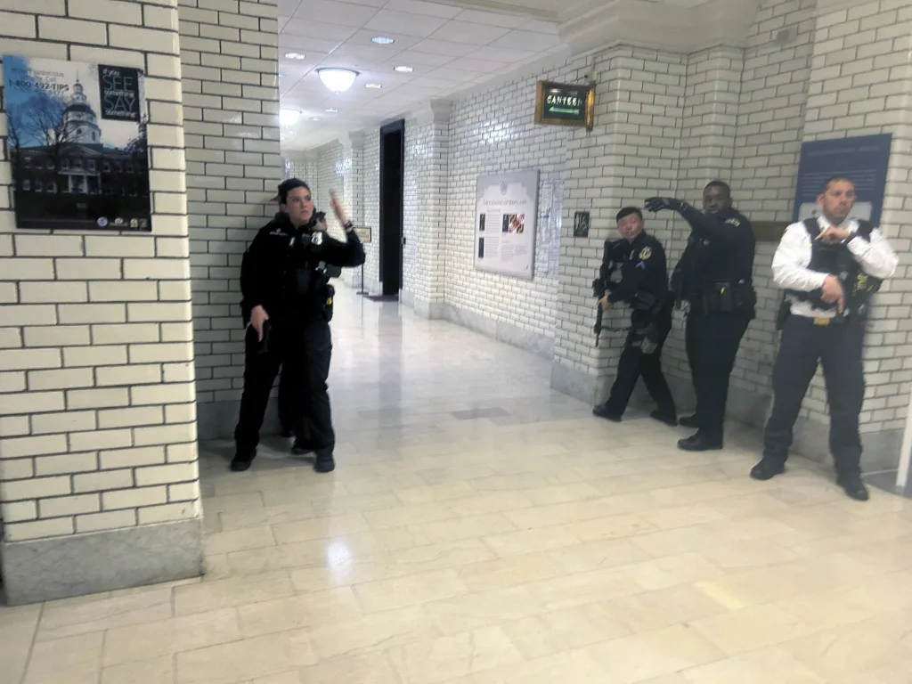 Police officers are seen during a lockdown of the Maryland State House in Annapolis, Md. on Thursday, Feb. 29, 2024. The building was locked down for an undisclosed security threat. (AP Photo/Brian Witte.)