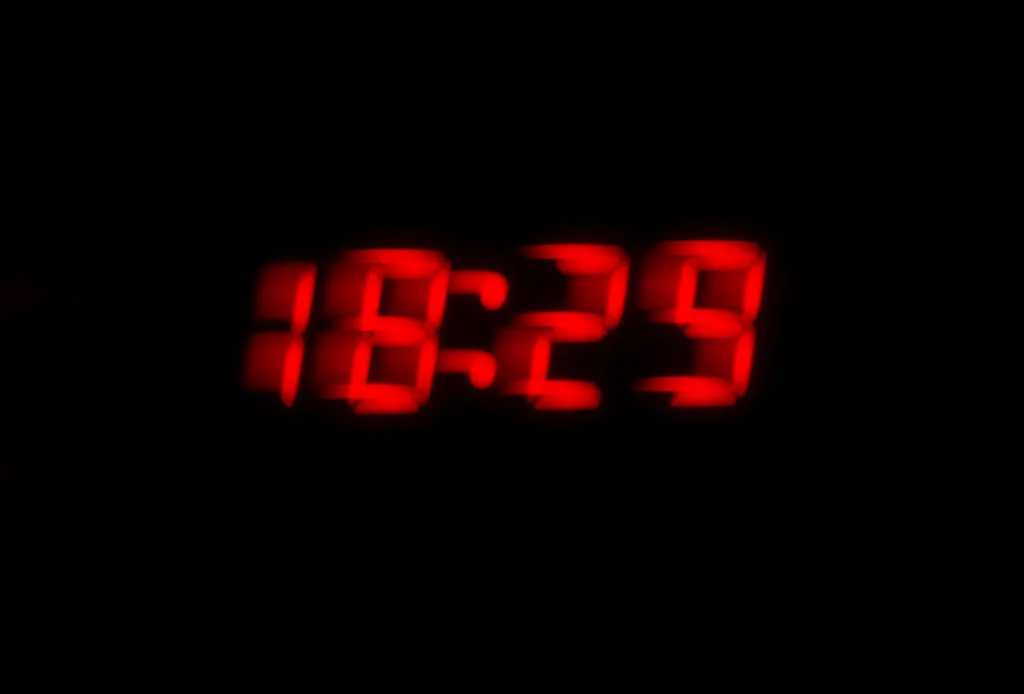 As people in the U.S. prepare to set their clocks ahead one hour on Sunday, March 10, 2024, I find myself bracing for the annual ritual of media stories about the disruptions to daily routinescaused by switching from standard time to daylight saving time. About one-third of Americans say they don’t look forward to these twice-yearly time changes. And nearly two-thirds would like to eliminate them completely, compared with 17% who aren’t sure and 21% who would like to keep moving their clocks back and forth. But the effects go beyond simple inconvenience. Researchers are discovering that “springing ahead” each March is connected with serious negative health effects, including an uptick in heart attacks and teen sleep deprivation. In contrast, the fall transition back to standard time is not associated with these health effects, as my co-authors and I explained in a 2020 commentary. I’ve studied the pros and cons of these twice-annual rituals for more than five years as a professor of neurology and pediatrics and the director of Vanderbilt University Medical Center’s sleep division. It’s become clear to me and many of my colleagues that the transition to daylight saving time each spring affects health immediately after the clock change and also for the nearly eight months that Americans remain on daylight saving time. Why our bodies are thrown off by DST Americans are split on whether they prefer permanent daylight saving time or permanent standard time. But a growing number of states are supporting permanent standard time. However, the two time shifts – jolting as they may be – are not equal. Standard time most closely approximates natural light, with the sun directly overhead at or near noon. In contrast, during daylight saving time from March until November, the clock change causes natural light to be present one hour later in the morning and one hour later in the evening according to clock time. Morning light is essential for helping to set the body’s natural rhythms: It wakes us up and improves alertness. Morning light also boosts mood – light boxes simulating natural light are prescribed for morning use to treat seasonal affective disorder. Although the exact reasons why light activates us and benefits our mood are not yet known, this may be due to light’s effects on increasing levels of cortisol, a hormone that modulates the stress response, or the effect of light on the amygdala, a part of the brain involved in emotions. Adolescents also may be chronically sleep-deprived due to school, sports and social activities. For instance, many children start school around 8 a.m. or earlier, which means that during daylight saving time they get up and travel to school in pitch darkness. The body of evidence makes a good case for adopting permanent standard time nationwide, as I testified at a March 2022 Congressional hearing and argued in a recent position statement for the Sleep Research Society. The American Medical Association recently called for permanent standard time. And in late 2022, Mexico adopted permanent standard time, citing benefits to health, productivity and energy savings. The biggest advantage of daylight saving time is that it provides an extra hour of light in the late afternoon or evening, depending on time of year, for sports, shopping or eating outside. However, exposure to light later into the evening for almost eight months during daylight saving time comes at a price. This extended evening light delays the brain’s release of melatonin, the hormone that promotes drowsiness, which in turn interferes with sleep and causes us to sleep less overall. Because puberty also causes melatonin to be released later at night, meaning that teenagers have a delay in the natural signal that helps them fall asleep, adolescents are particularly susceptible to sleep problems from the extended evening light. This shift in melatonin during puberty lasts into our 20s. The ‘western edge’ effect Geography can also make a difference in how daylight saving time affects people. One study showed that people living on the western edge of a time zone, who get light later in the morning and later in the evening, got less sleep than their counterparts on the eastern edge of a time zone. This study found that western-edge residents had higher rates of obesity, diabetes, heart disease and breast cancer, as well as lower per capita income and higher health care costs. Other research has found that rates of certain other cancers are higher on the western edge of a time zone. Scientists believe that these health problems may result from a combination of chronic sleep deprivation and “circadian misalignment.” Circadian misalignment refers to a mismatch in timing between our biological rhythms and the outside world. In other words, the timing of daily work, school or sleep routines is based on the clock, rather than on the sun’s rise and set. A brief history of daylight saving time Congress instituted year-round daylight saving time during World War I and World War II, and once again during the energy crisis of the early 1970s. But the popularity of year-round daylight saving time fell from 79% to 42% after it went into effect in January 1974, largely due to safety concerns about children going to school in the dark. The idea at that time was that having extra light later into the afternoon would save energy by decreasing the need for electric lighting. This idea has since been proved largely inaccurate, as heating needs may increase in the morning in the winter, while air conditioning needs can also increase in the late afternoon in the summer. After World War II, designating the start and end dates for daylight saving time fell to state governments. Because this created many railroad scheduling and safety problems, however, Congress passed the Uniform Time Act in 1966. This law set the nationwide dates of daylight saving time from the last Sunday in April until the last Sunday in October. In 2007, Congress amended the act to expand the period in which daylight saving time is in effect from the second Sunday in March to the first Sunday in November – dates that remain in effect today. But the Uniform Time Act does allow states and territories to opt out of daylight saving time. Arizona and Hawaii are on permanent standard time, along with Puerto Rico, the U.S. Virgin Islands, Northern Mariana Islands, Guam and American Samoa. A shifting landscape As of March 2024, 17 states have passed laws to adopt year-round daylight saving time. But federal law requires that they need to wait for Congress, and in some cases also neighboring states, to act. More than two dozen states introduced legislation related to the clock change in 2023, but no laws were passed. Meanwhile, proposed legislation and resolutions for permanent standard time have increased from 15% in 2021 to 37% in 2024. In March 2022, the U.S. Senate passed the Sunshine Protection Act in a bid to make daylight saving time permanent. But the House did not move forward with this legislation. Florida Sen. Marco Rubio reintroduced the bill on March 1, 2023, but this bill has not progressed. The spike in activity among states seeking to break from these twice-yearly changes reflects how more people are recognizing the downsides of this practice. Now, it’s in the hands of legislators to decide whether to end the time shift altogether and to either choose a full year of having clocks more aligned with the sun or to artificially extend the day for more than half the year, for better or for worse. This is an updated version of an article originally published on March 10, 2022. This article is republished from The Conversation under a Creative Commons license. Read the original article here: https://theconversation.com/could-the-days-of-springing-forward-be-numbered-a-neurologist-and-sleep-expert-explains-the-downside-to-that-borrowed-hour-of-daylight-224597.