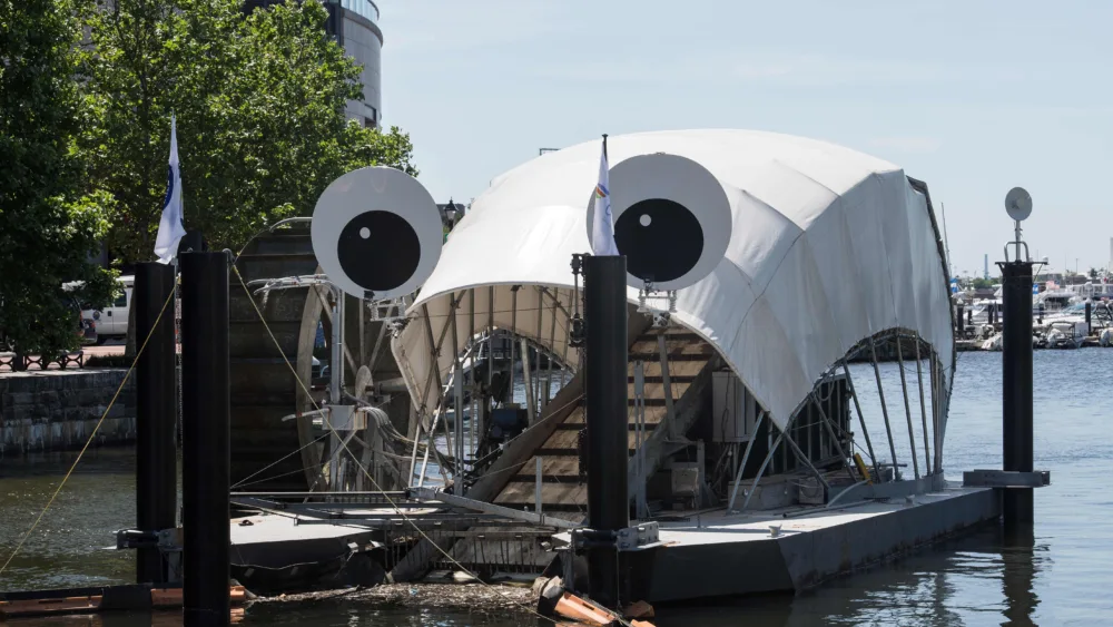 View of the Inner Harbor Water Wheel, also known as Mr. Trash Wheel, in Baltimore, Maryland, on June 1, 2017. Mr. Trash Wheel combines water and solar power to collect litter and debris flowing down the Jones Falls River before it enters Baltimore harbor. / AFP PHOTO / Nicholas Kamm (Photo credit should read NICHOLAS KAMM/AFP via Getty Images)