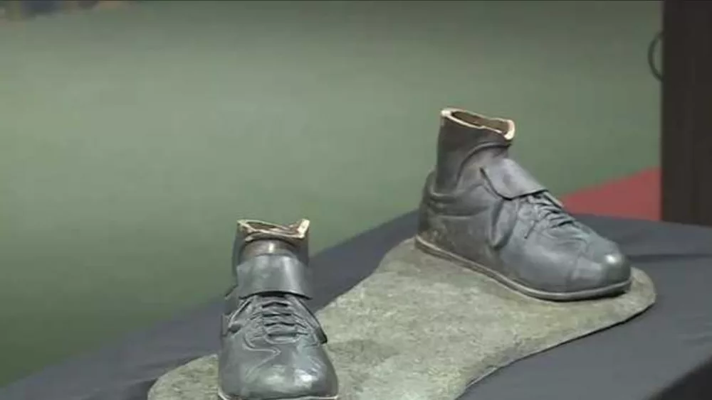 The bronze cleats from a damaged Jackie Robinson statue have been donated to the Negro Leagues Baseball Museum in Kansas City.