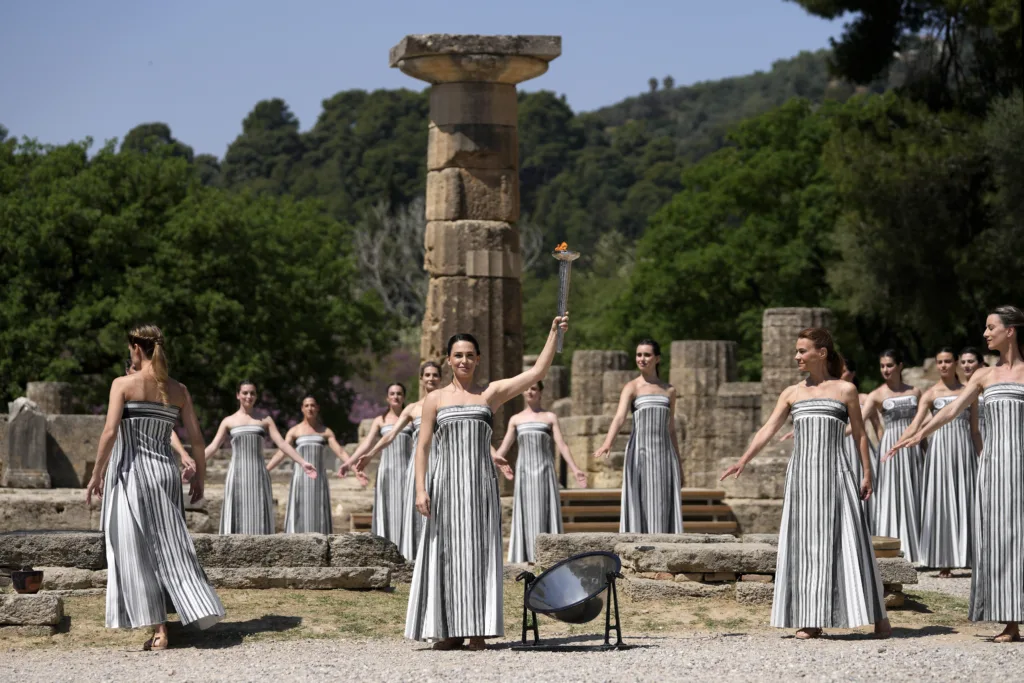 Despite weather glitch, the Paris Olympics flame is lit at the Greek