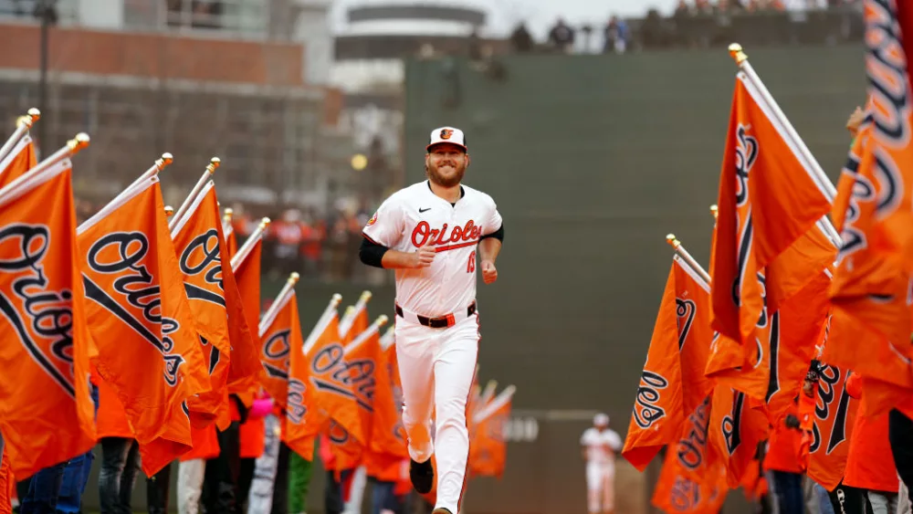BALTIMORE, MD - MARCH 28: Cole Irvin #19 of the Baltimore Orioles runs on field during introductions prior to the game between the Los Angeles Angels and the Baltimore Orioles at Oriole Park at Camden Yards on Thursday, March 28, 2024 in Baltimore, Maryland. (Photo by Daniel Shirey/MLB Photos via Getty Images)