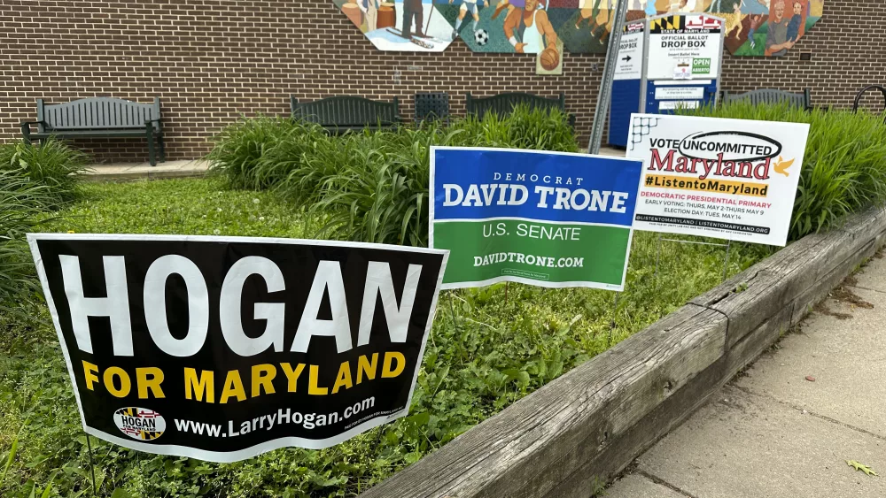 Signs are pictured outside an early voting center on Thursday, May 9, 2024, in Rockville, Md. President Joe Biden and former President Donald Trump look to pad their delegate totals in Maryland Tuesday, May 14. Maryland voters will also decide contested primaries in a Senate race. Former GOP Gov. Larry Hogan's late entry into the race has given Republicans hope of a possible pick-up in a state that hasn't elected a Republican U.S. senator since 1980. The leading Democratic primary candidates are U.S. Rep. David Trone and Prince George's County Executive Angela Alsobrooks. (AP Photo/Robert Yoon)