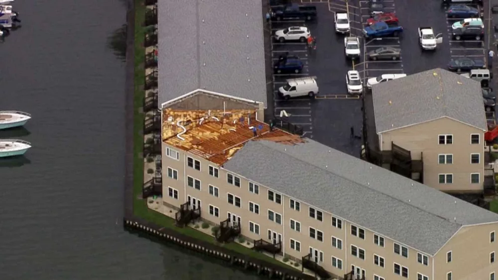 Storms tore off part of a roof from a condo building in Ocean City in the area of 52nd Street. Odyssea Watersports told 11 News debris was strewn everywhere from the roads to the channel.
