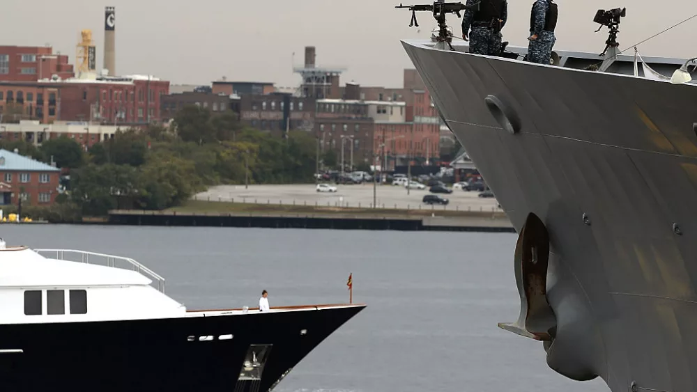 BALTIMORE, MD - OCTOBER 13: Two US Navy sailors stand on the bow of the USS Leyte Gulf that is moored to a dock in Baltimore Harbor on October 13, 2016 in Baltimore, Maryland. This week the City of Baltimore is holding its annual Fleet Week and Air Show. (Photo by Mark Wilson/Getty Images)