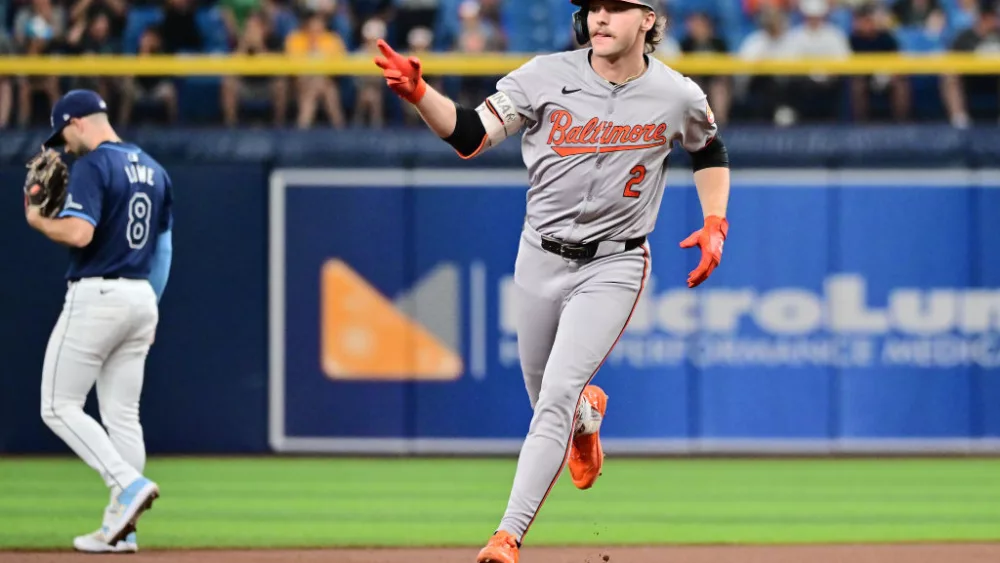 Gunnar Henderson #2 of the Baltimore Orioles runs the bases after hitting a home run in the first inning