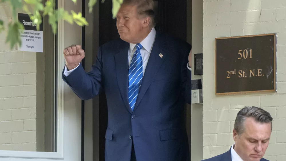 Republican presidential candidate former President Donald Trump gestures to supporters as he leaves after a visit to the offices of Safari Club International Thursday, June 13, 2024, in Washington. (AP Photo/Mark Schiefelbein)