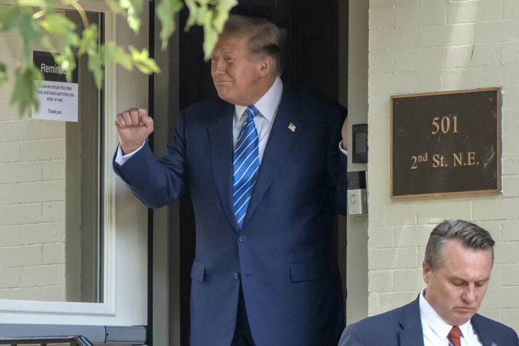 Republican presidential candidate former President Donald Trump gestures to supporters as he leaves after a visit to the offices of Safari Club International Thursday, June 13, 2024, in Washington. (AP Photo/Mark Schiefelbein)