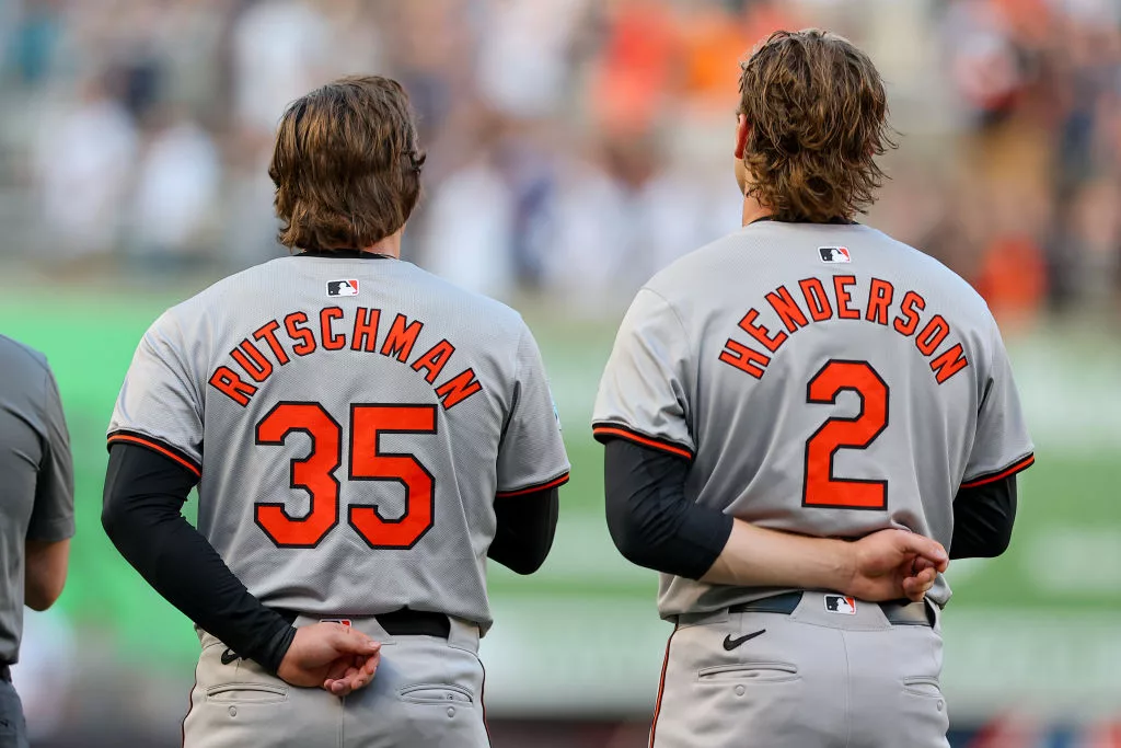 BRONX, NY - JUNE 18: Adley Rutschman #35 of the Baltimore Orioles and Gunnar Henderson #2 during the National Anthem on the field prior to the game against the New York Yankees on June 18, 2024 at Yankee Stadium in Bronx, New York. (Photo by Rich Graessle/Icon Sportswire via Getty Images)