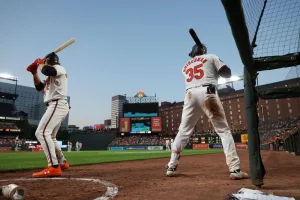 BALTIMORE, MARYLAND - JUNE 12: Gunnar Henderson #2 of the Baltimore Orioles and Adley Rutschman #35 on deck in the seventh inning against the Atlanta Braves at Oriole Park at Camden Yards on June 12, 2024 in Baltimore, Maryland. (Photo by Brandon Sloter/Image Of Sport/Getty Images)